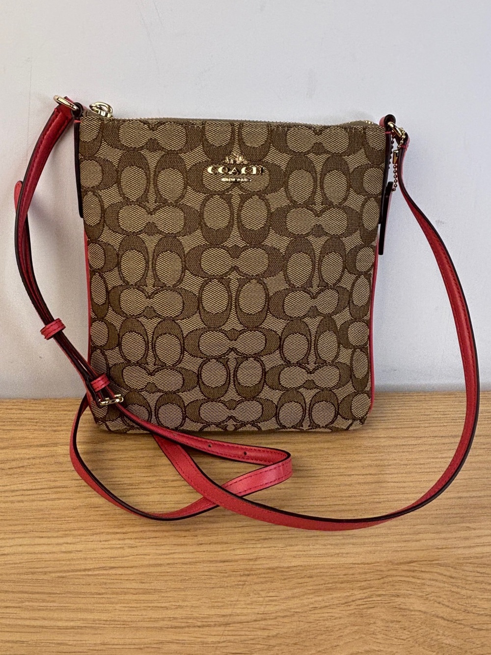 Coach Signature North/South Swing pack Crossbody Bag Outline Coral Pink LIKE NEW